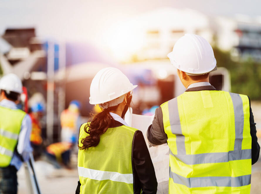 Workers standing in front of movie scene